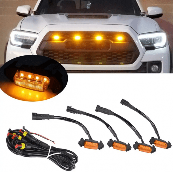 Signature lumineuse orange sur calandre